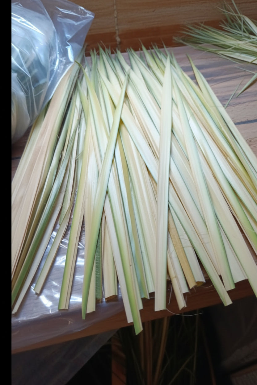 Strips of green and yellow material on a wooden surface